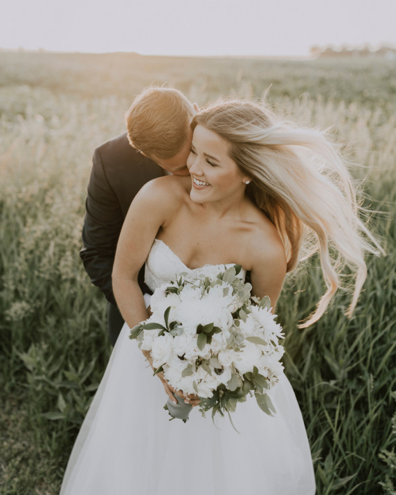 Bride and groom pose